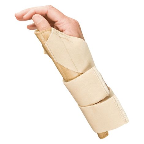 A hand wearing a beige thumb spike stabilizer splint, with Velcro straps and metal splint visible.