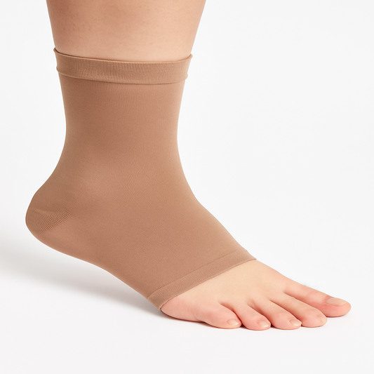 Beige compression sock on a white background