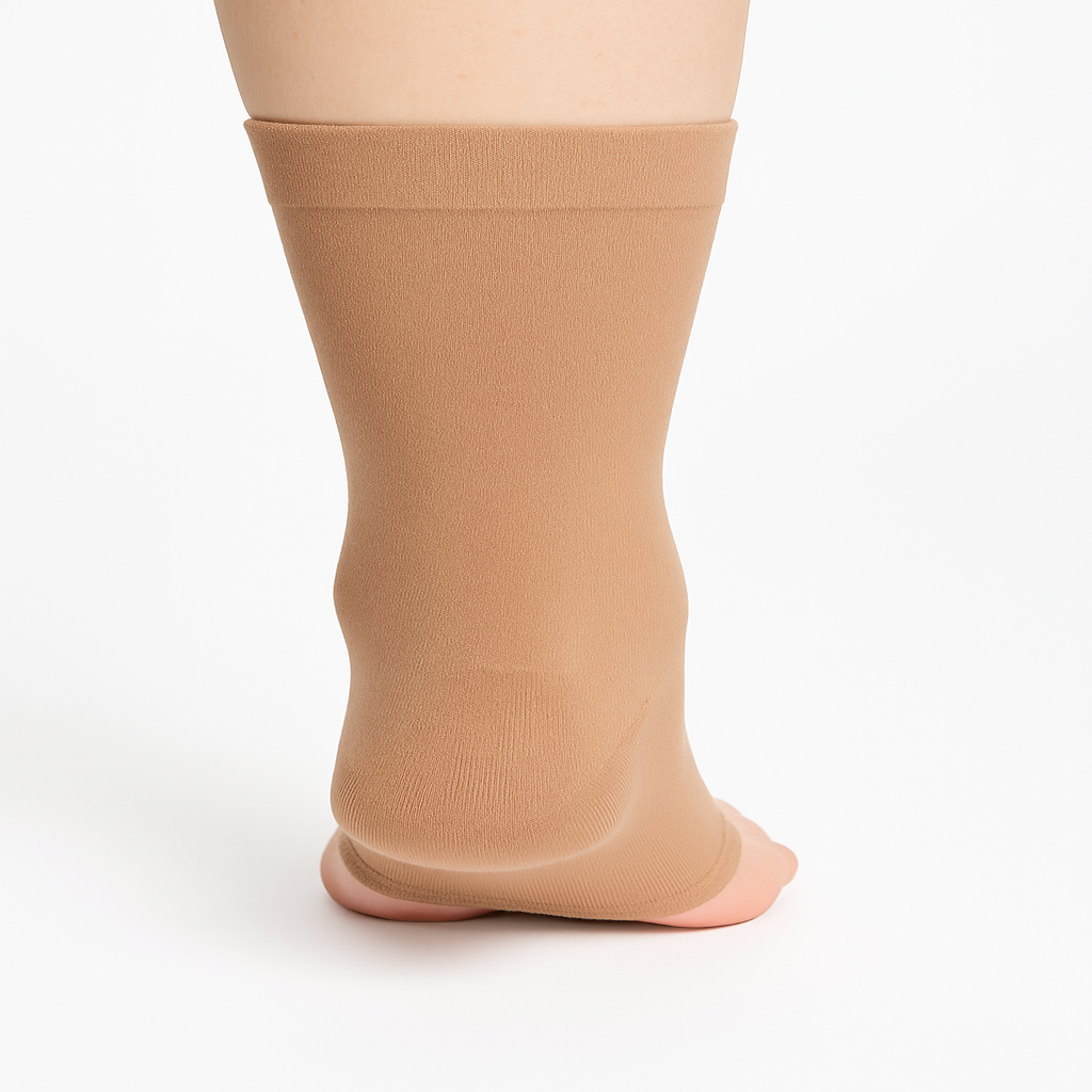 Beige compression stocking on a white background